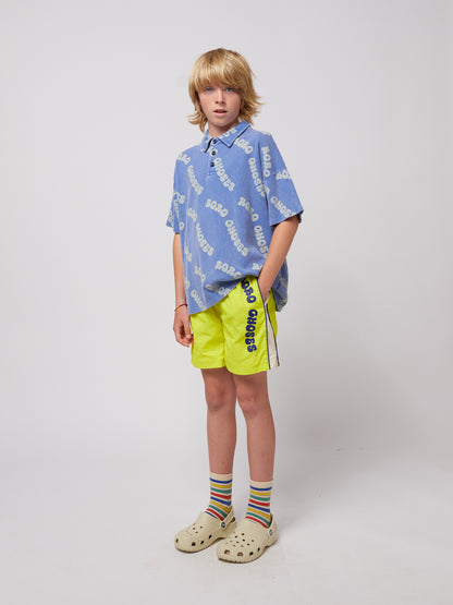 Wavy Bobo Choses all over Waffle Polo Shirt, Blue